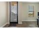 Bright entryway with wood flooring and a view through the glass front door at 4354 N 27Th Pl, Phoenix, AZ 85016