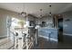 Modern kitchen and dining area featuring hardwood floors and stainless steel appliances at 4354 N 27Th Pl, Phoenix, AZ 85016