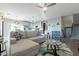 Open living room featuring stairs, hardwood floors, and modern lighting at 4354 N 27Th Pl, Phoenix, AZ 85016