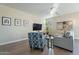 Cozy living room featuring hardwood floors, a ceiling fan and comfortable seating at 4354 N 27Th Pl, Phoenix, AZ 85016