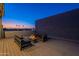 Inviting rooftop deck featuring cozy seating around a fire pit, offering a tranquil outdoor space at 4354 N 27Th Pl, Phoenix, AZ 85016