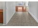 Tiled hallway leading to living area at 4421 W Pleasant Ln, Laveen, AZ 85339