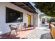 Small front porch with table and chairs at 45 E Woodward Dr, Phoenix, AZ 85004