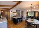 Modern kitchen with island and exposed brick wall at 45 E Woodward Dr, Phoenix, AZ 85004