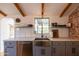 Modern kitchen with stainless steel appliances and marble countertops at 45 E Woodward Dr, Phoenix, AZ 85004