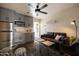 Living room with gray sofa and kitchen at 45 E Woodward Dr, Phoenix, AZ 85004