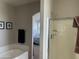 Bathroom features a soaking tub and a separate shower at 45717 W Ranch Rd, Maricopa, AZ 85139