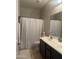 Bathroom boasts double sinks and a shower/tub combo at 45717 W Ranch Rd, Maricopa, AZ 85139