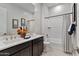 Bathroom with double vanity, tub, and shower at 4931 E Village Dr, Scottsdale, AZ 85254