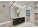 Elegant bathroom with double vanity, large shower, and modern fixtures at 4931 E Village Dr, Scottsdale, AZ 85254