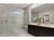 Main bathroom with a large shower and double vanity at 4931 E Village Dr, Scottsdale, AZ 85254