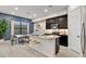 Modern kitchen with granite countertops and stainless steel appliances at 4931 E Village Dr, Scottsdale, AZ 85254