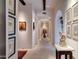 Long hallway showcasing artwork and tasteful decor at 4949 E Lincoln Dr # 34, Paradise Valley, AZ 85253