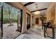 Open and inviting hallway with double doors leading to a charming courtyard at 4949 E Lincoln Dr # 34, Paradise Valley, AZ 85253