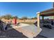 Backyard oasis featuring a sparkling pool, patio, and exercise equipment at 5496 S 237Th Ln, Buckeye, AZ 85326