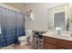 Clean bathroom with shower/tub combo, vanity, and storage at 5496 S 237Th Ln, Buckeye, AZ 85326