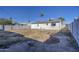 View of backyard, showing home's rear elevation at 5538 N 63Rd Ave, Glendale, AZ 85301