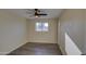 Bright bedroom featuring wood-look floors and ceiling fan at 5538 N 63Rd Ave, Glendale, AZ 85301