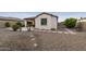 Landscaped backyard with stone pathway at 5715 S Winchester --, Mesa, AZ 85212