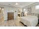 Main bedroom with ceiling fan and en-suite bathroom access at 5715 S Winchester --, Mesa, AZ 85212