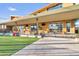 Relaxing community clubhouse with outdoor seating and lawn area at 5715 S Winchester --, Mesa, AZ 85212