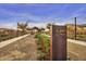 Landscaped community garden with covered pavilion and walking paths at 5715 S Winchester --, Mesa, AZ 85212