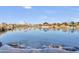 Tranquil community lake with a waterfall feature at 5715 S Winchester --, Mesa, AZ 85212