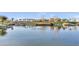 Beautiful community lake reflecting homes and sky at 5715 S Winchester --, Mesa, AZ 85212