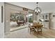 Dining area with sliding glass doors opening to patio at 5715 S Winchester --, Mesa, AZ 85212