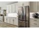 Modern kitchen features stainless steel refrigerator and espresso machine at 5715 S Winchester --, Mesa, AZ 85212