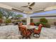 Covered patio with table, chairs and heaters at 5715 S Winchester --, Mesa, AZ 85212