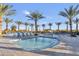 Community pool and spa with lounge chairs at 5715 S Winchester --, Mesa, AZ 85212