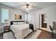 Spacious main bedroom with a ceiling fan, walk-in closet, and neutral color palette at 7009 E Acoma Dr # 1004, Scottsdale, AZ 85254