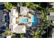 Aerial view of the community pool and amenity center with covered seating and manicured landscaping at 7009 E Acoma Dr # 1004, Scottsdale, AZ 85254