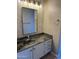 Bathroom with herringbone tile and single vanity at 7146 W Emile Zola Ave, Peoria, AZ 85381