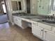 Double vanity bathroom with marble countertop at 7146 W Emile Zola Ave, Peoria, AZ 85381