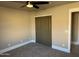 Spacious bedroom with neutral walls and carpet at 7146 W Emile Zola Ave, Peoria, AZ 85381