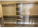 Large walk-in closet with ample shelving and hanging space at 7146 W Emile Zola Ave, Peoria, AZ 85381