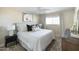 Bright bedroom with comfy bed and a ceiling fan at 7301 E Almeria Rd, Scottsdale, AZ 85257