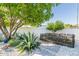 Landscaped garden with gravel, succulents, and a wooden fence at 7301 E Almeria Rd, Scottsdale, AZ 85257