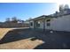 Home exterior showcasing a backyard patio at 7602 W Minnezona Ave, Phoenix, AZ 85033