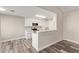 Modern kitchen with white shaker cabinets and quartz countertops at 7602 W Minnezona Ave, Phoenix, AZ 85033