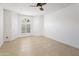 Bedroom with tile floors and arched window with shutters at 7729 N Via De Fonda --, Scottsdale, AZ 85258