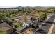 Wide aerial view of the house and surrounding neighborhood at 8951 E Wethersfield Rd, Scottsdale, AZ 85260