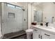 Modern bathroom with a large shower and white vanity at 8951 E Wethersfield Rd, Scottsdale, AZ 85260