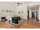 Primary bedroom with hardwood floors, neutral walls and access to other rooms at 8951 E Wethersfield Rd, Scottsdale, AZ 85260