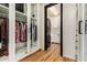 Large closet with built-in shelving and laundry access at 8951 E Wethersfield Rd, Scottsdale, AZ 85260