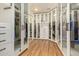 Spacious walk-in closet with ample shelving and hanging space at 8951 E Wethersfield Rd, Scottsdale, AZ 85260