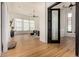 Hardwood floors and neutral walls connect the bedroom to other areas at 8951 E Wethersfield Rd, Scottsdale, AZ 85260