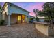 Outdoor kitchen and patio with flagstone flooring at 8951 E Wethersfield Rd, Scottsdale, AZ 85260